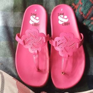 Sandles that are pink, there a size 7, and there from Sam&Libby